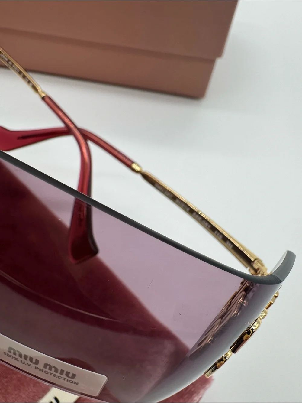 Miu Miu Purple Rimless Sunglasses with Gold Accents